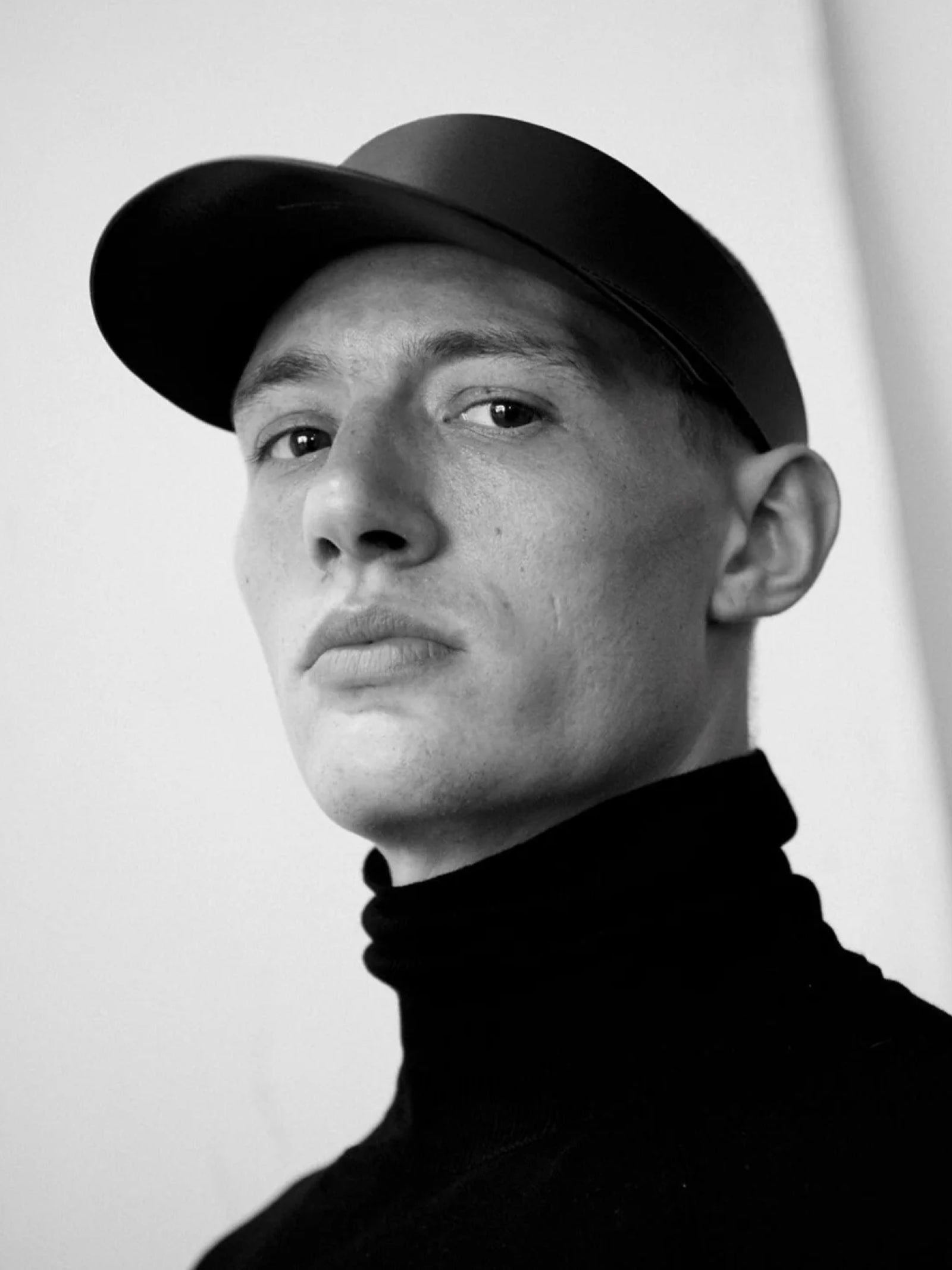 man wearing yvy leather cap visor 