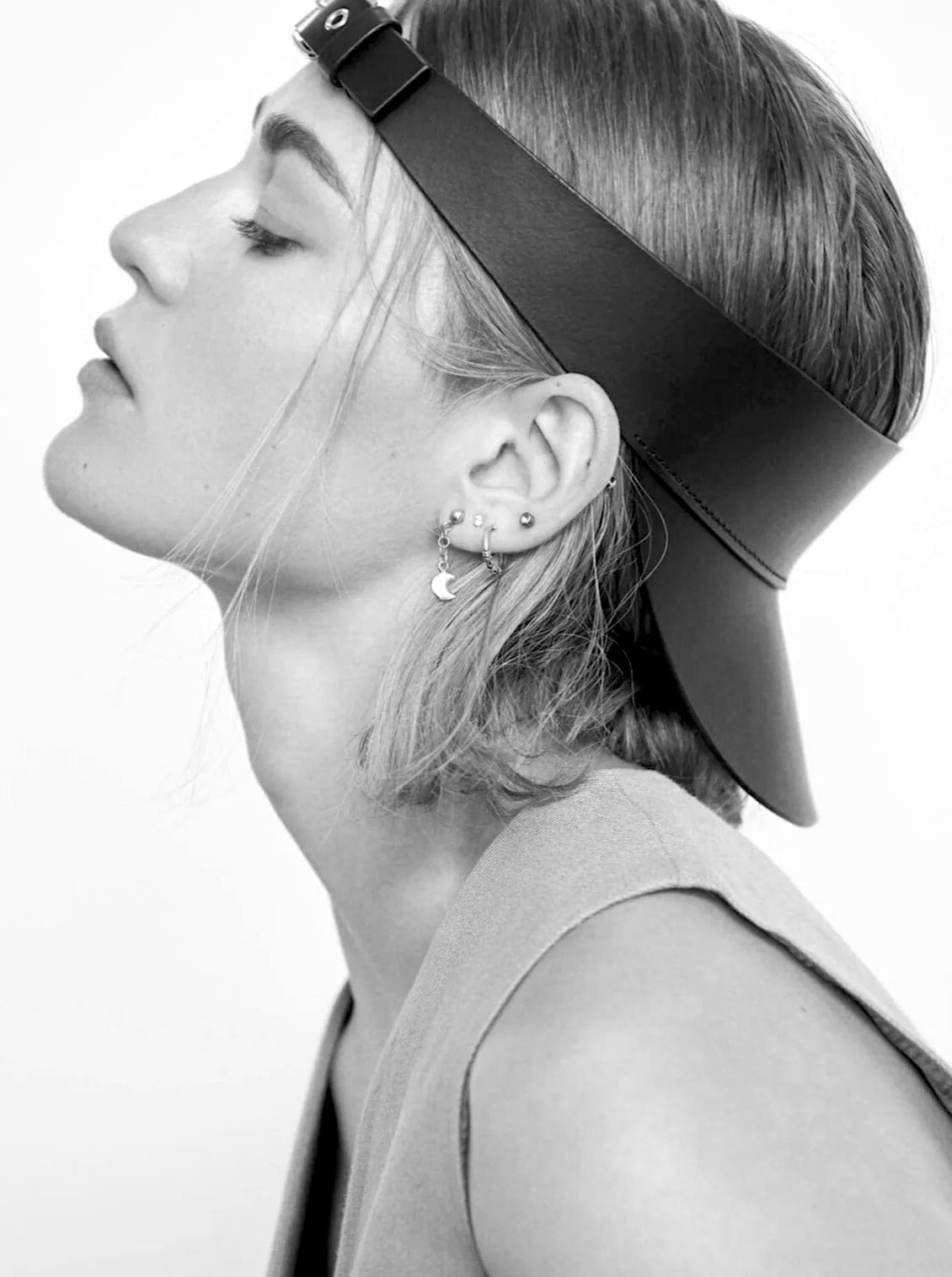 woman wearing yvy leather cap visor side view