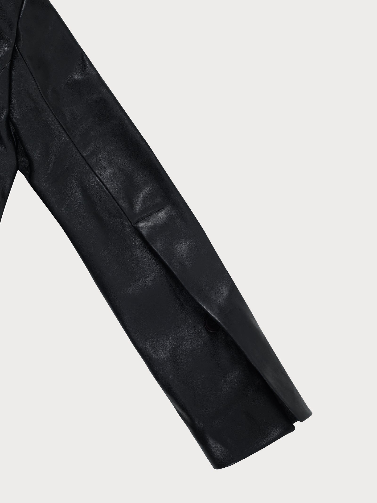 A closeup of a durable black buttery-soft breathable lamb leather jacket with lining 