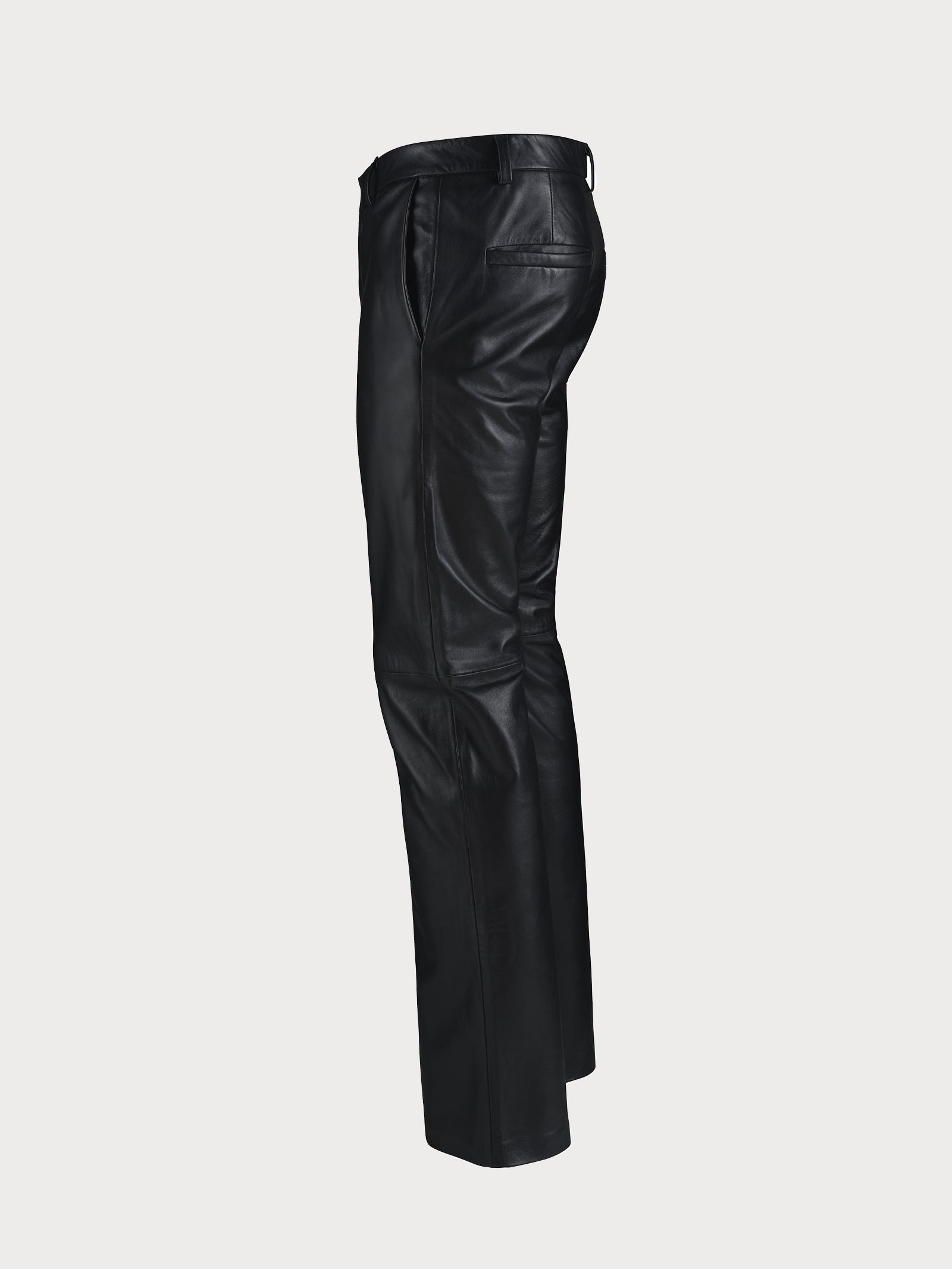 Black leather pants on a light gray background