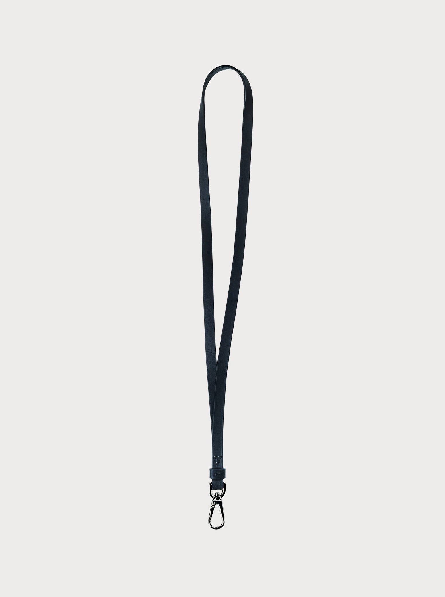 front view of long yvy leather minimalist keychain with silver hardware
