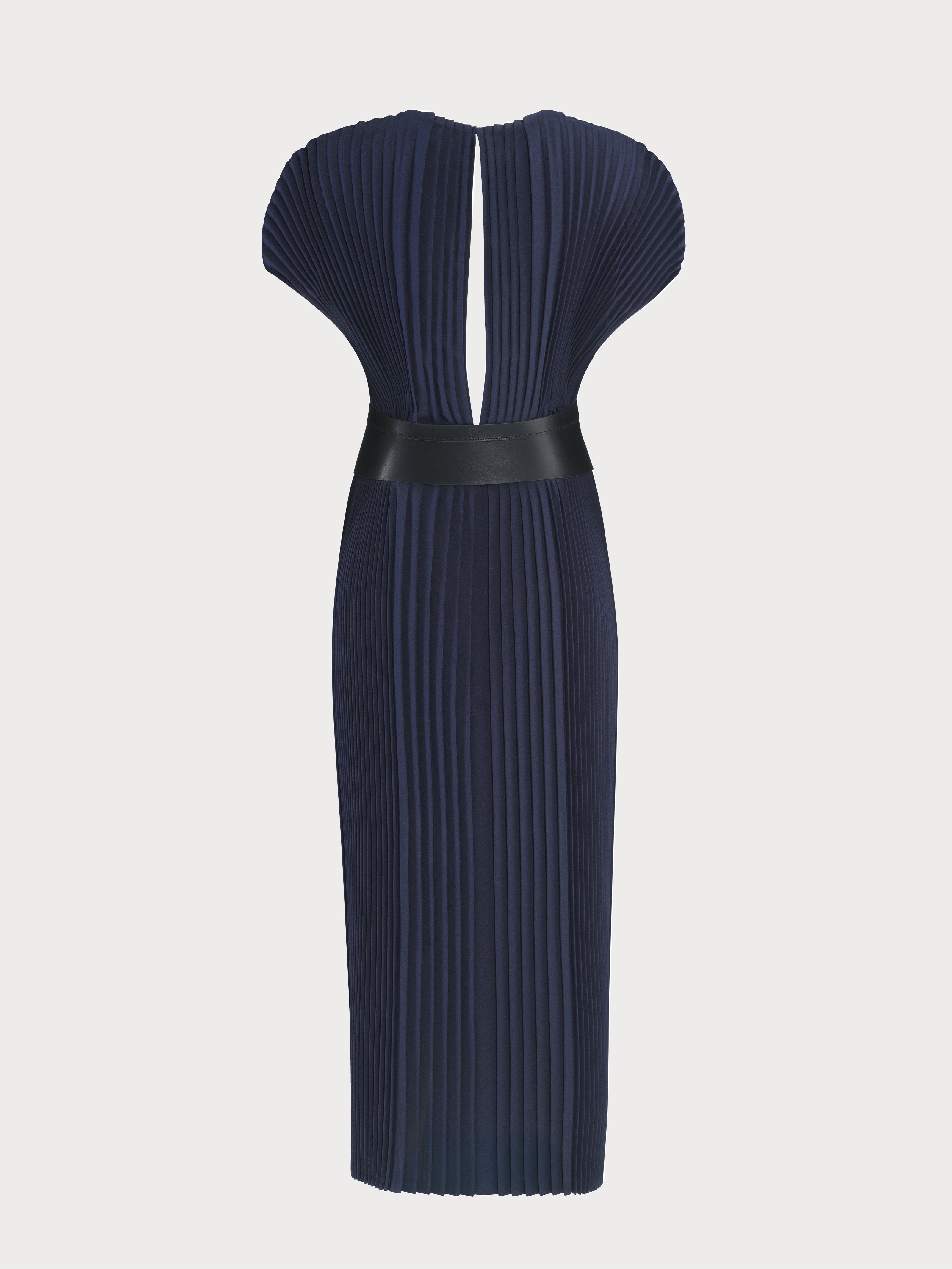 yvy navy blue long plisse dress with black curve belt with silver hardware, back view