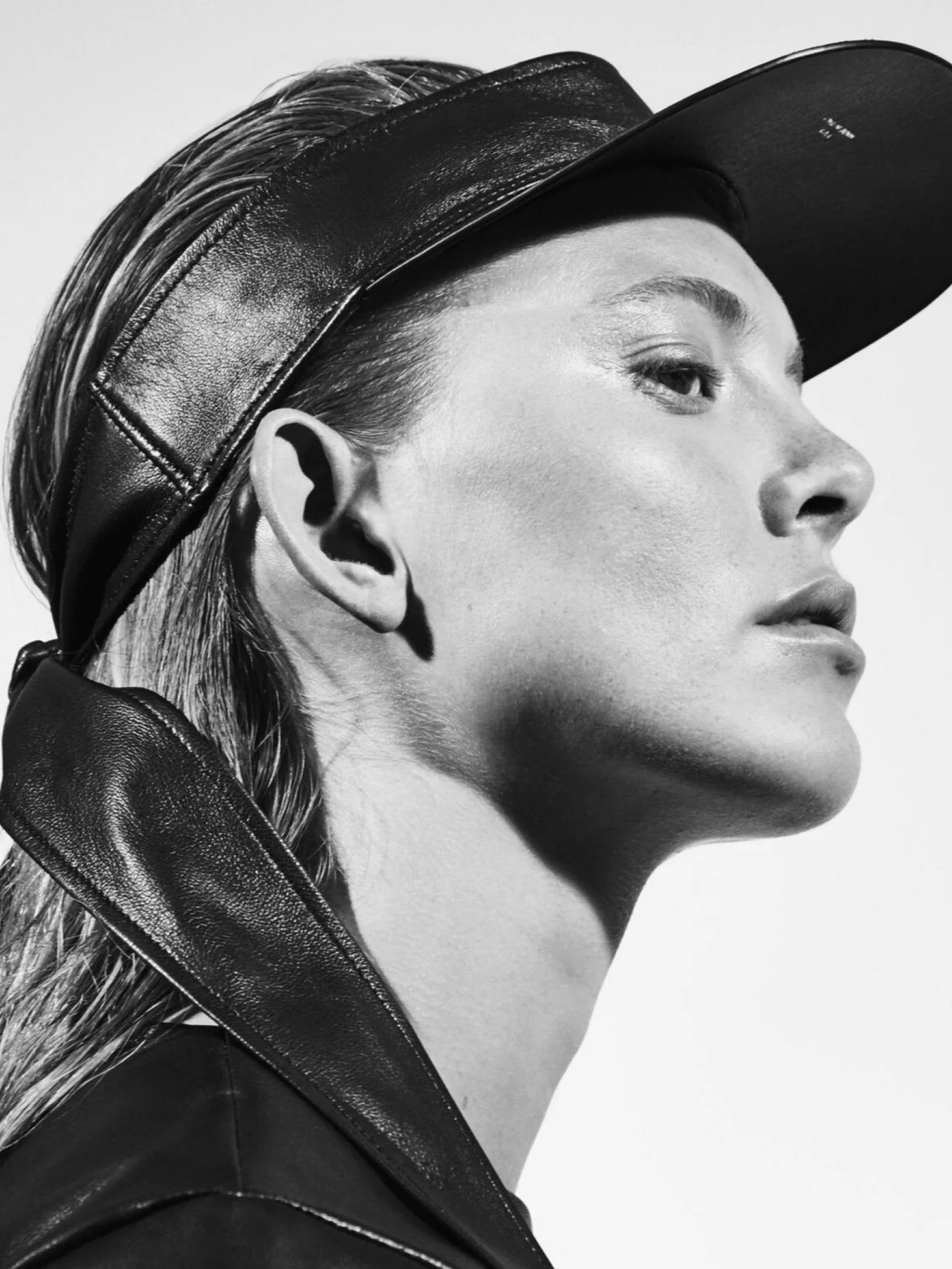 woman wearing yvy leather scarf visor 