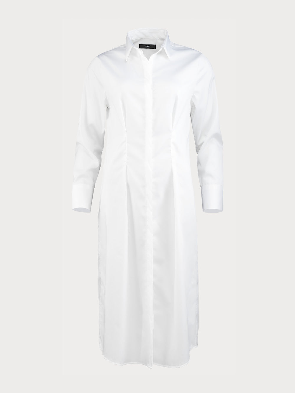 Long white yvy cotton shirt with long sleeves, a button-down design and classic collar, displayed on a plain background