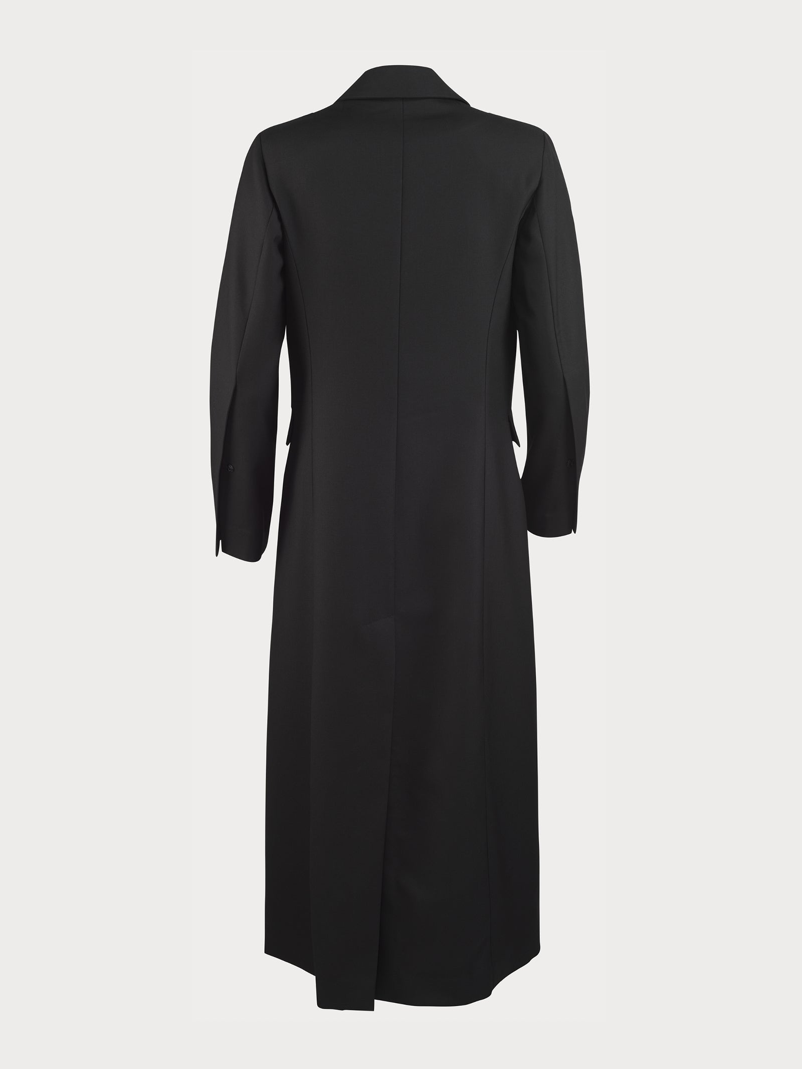 Back view of a long black tailored yvy suit coat with a structured silhouette, featuring minimalist design and a single vent for ease of movement