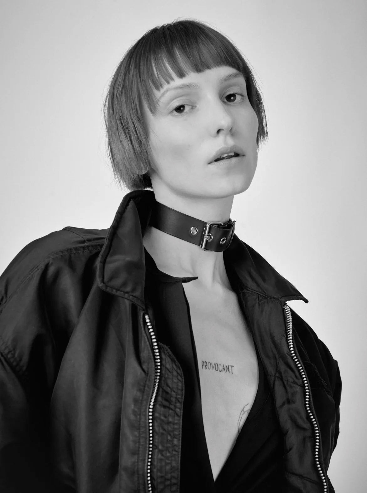 a female model wearing yvy leather buckle choker in black with silver hardware