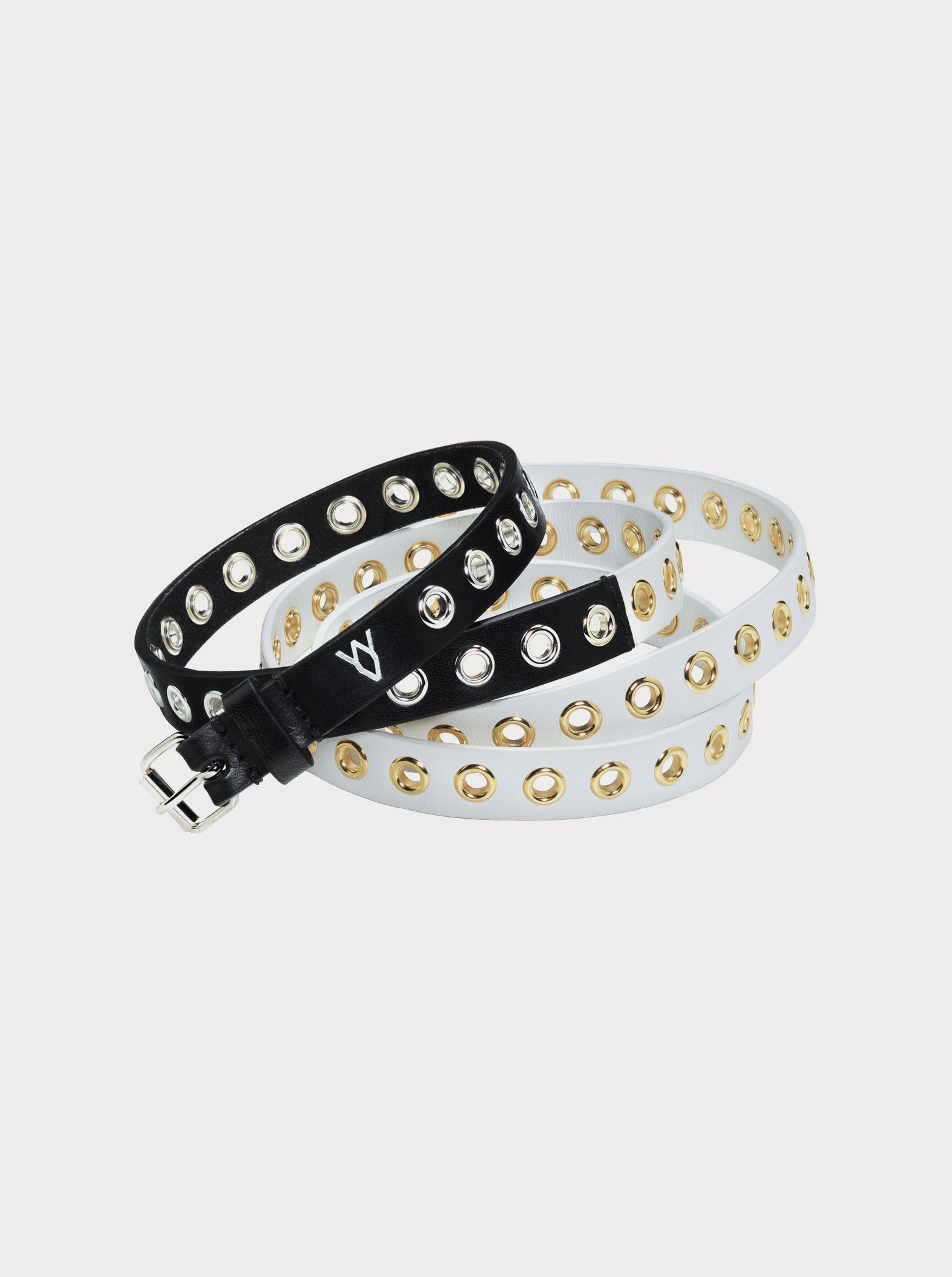 thin two-tone black and white yvy leather eyelet belt with silver and gold hardware