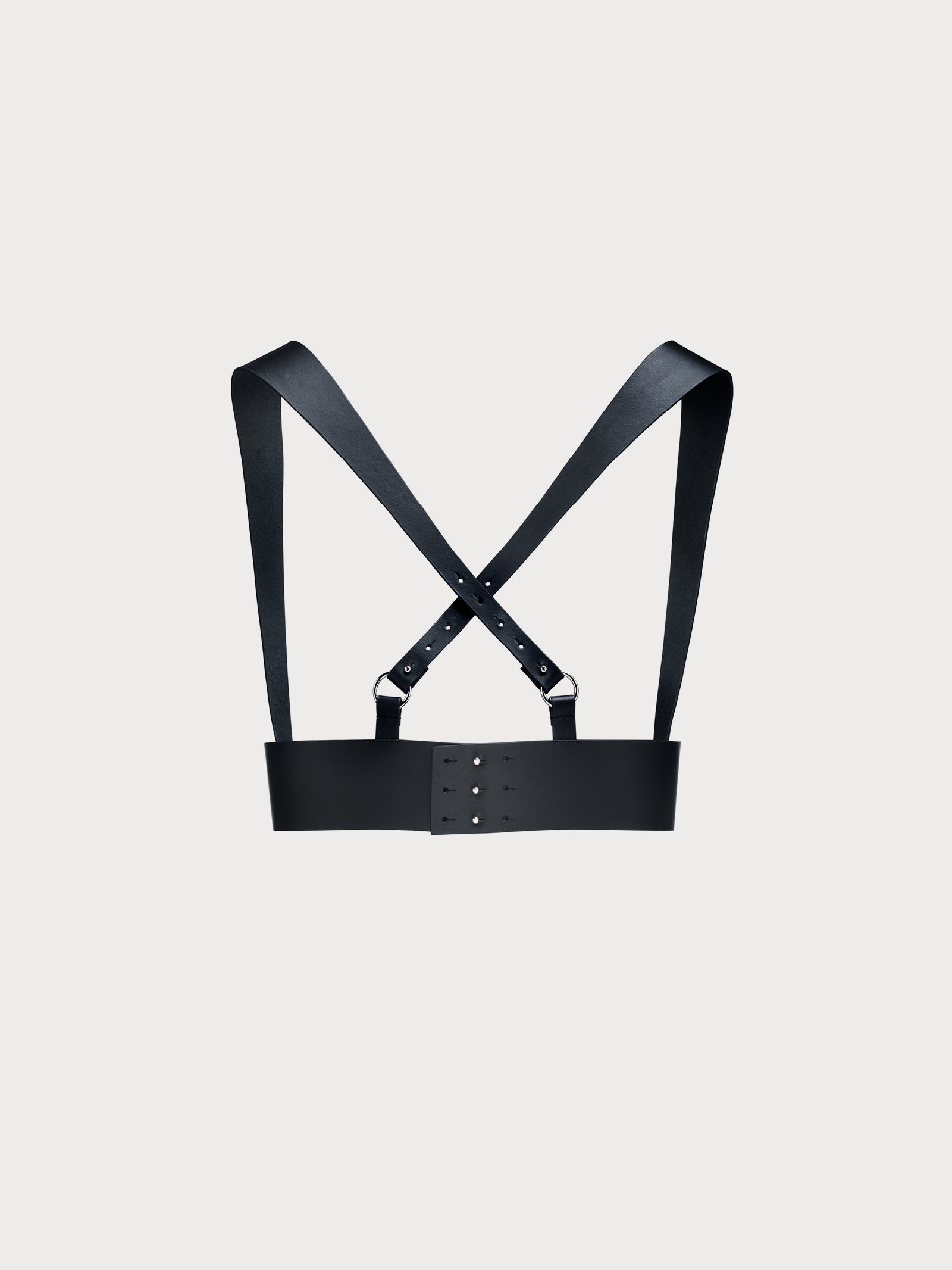 back view of yvy leather uni vest in black with criss-crossed straps