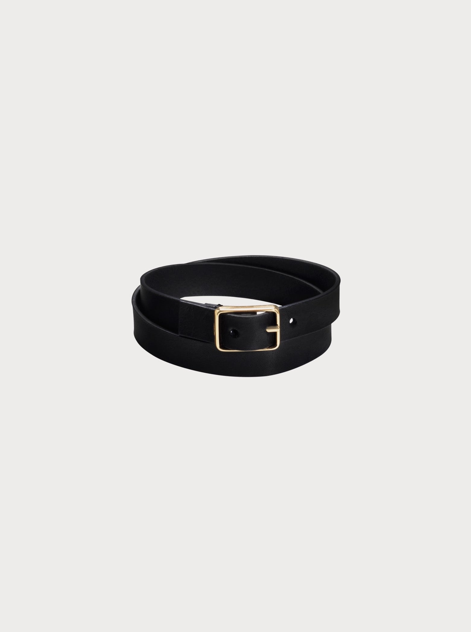 yvy leather minimalist choker in black with gold hardware looped twice to be worn as a bracelet