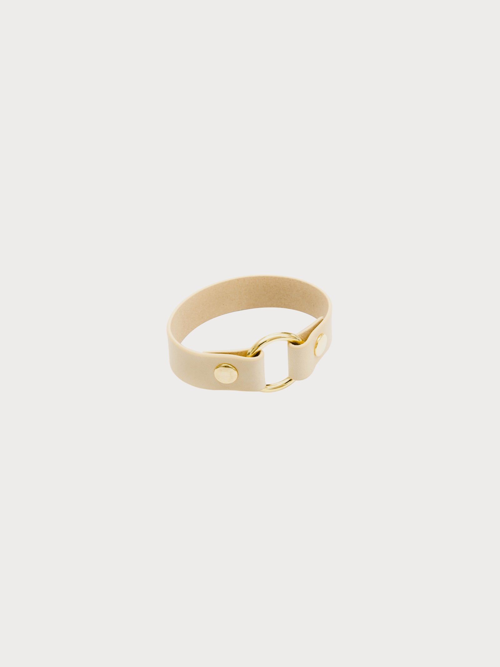 nude leather yvy bracelet with ring detail and gold hardware